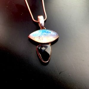 Moonstone and obsidian pendant